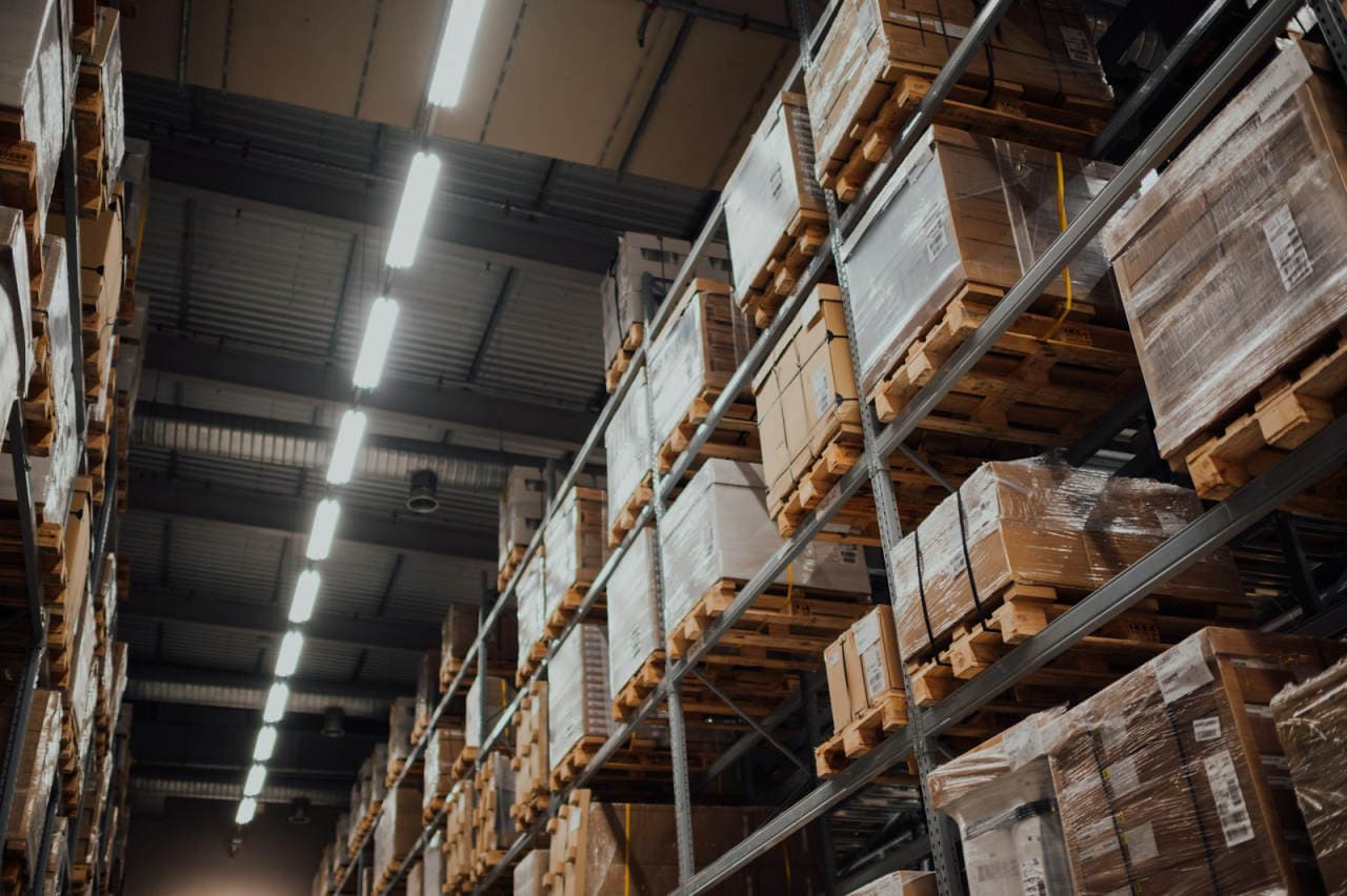 Boxed pallets of stock on warehouse racking